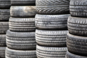 pile of used tyres in Hamilton yard