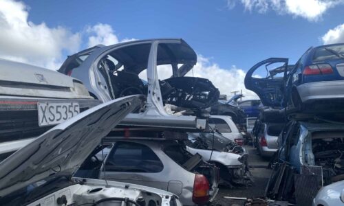 Pile of scrap vehicles at Mega Wreckers Hamilton yard car wreckers te aroha